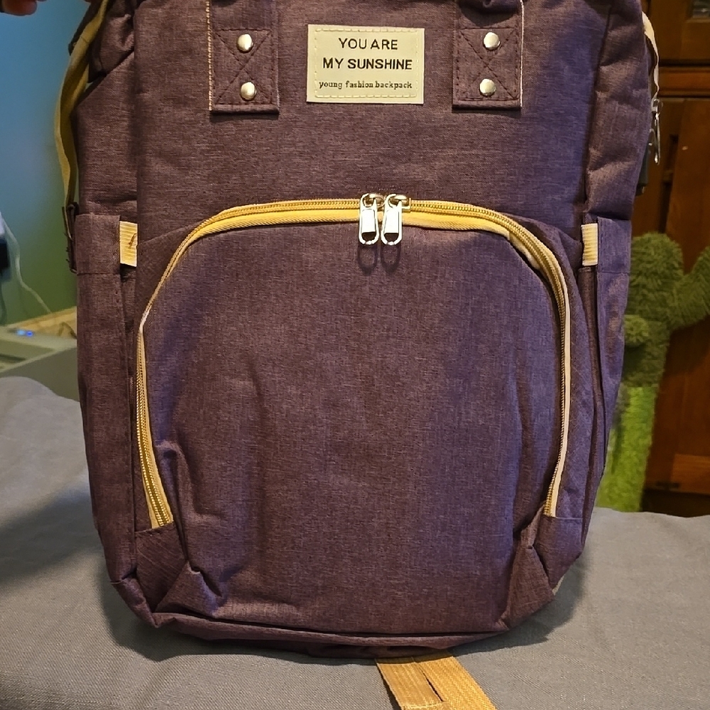 Purple and Tan Backpack with Gold Hardware